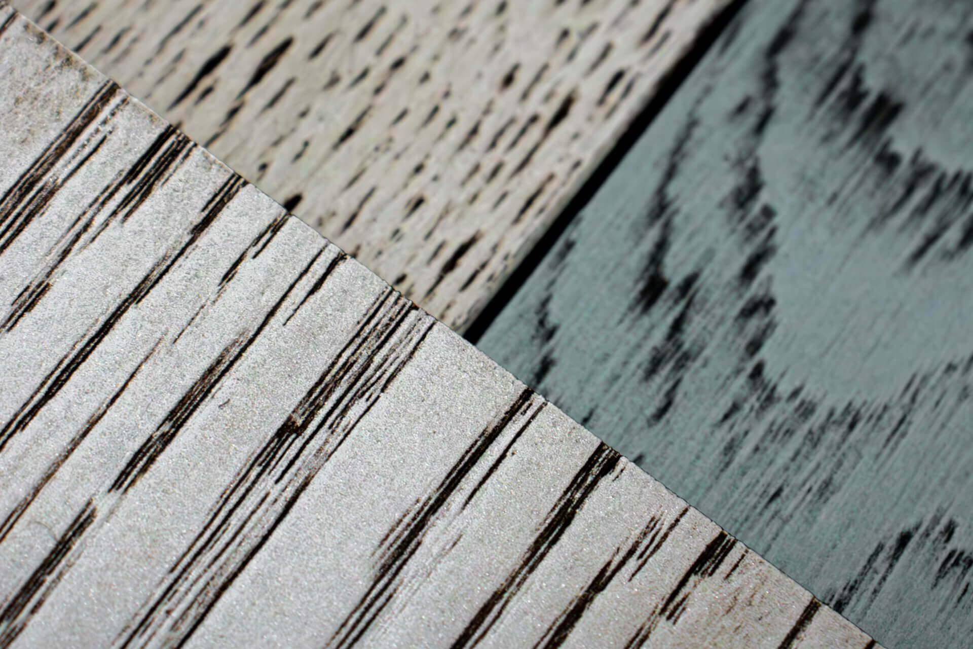 Three parquet boards varnished with different colors