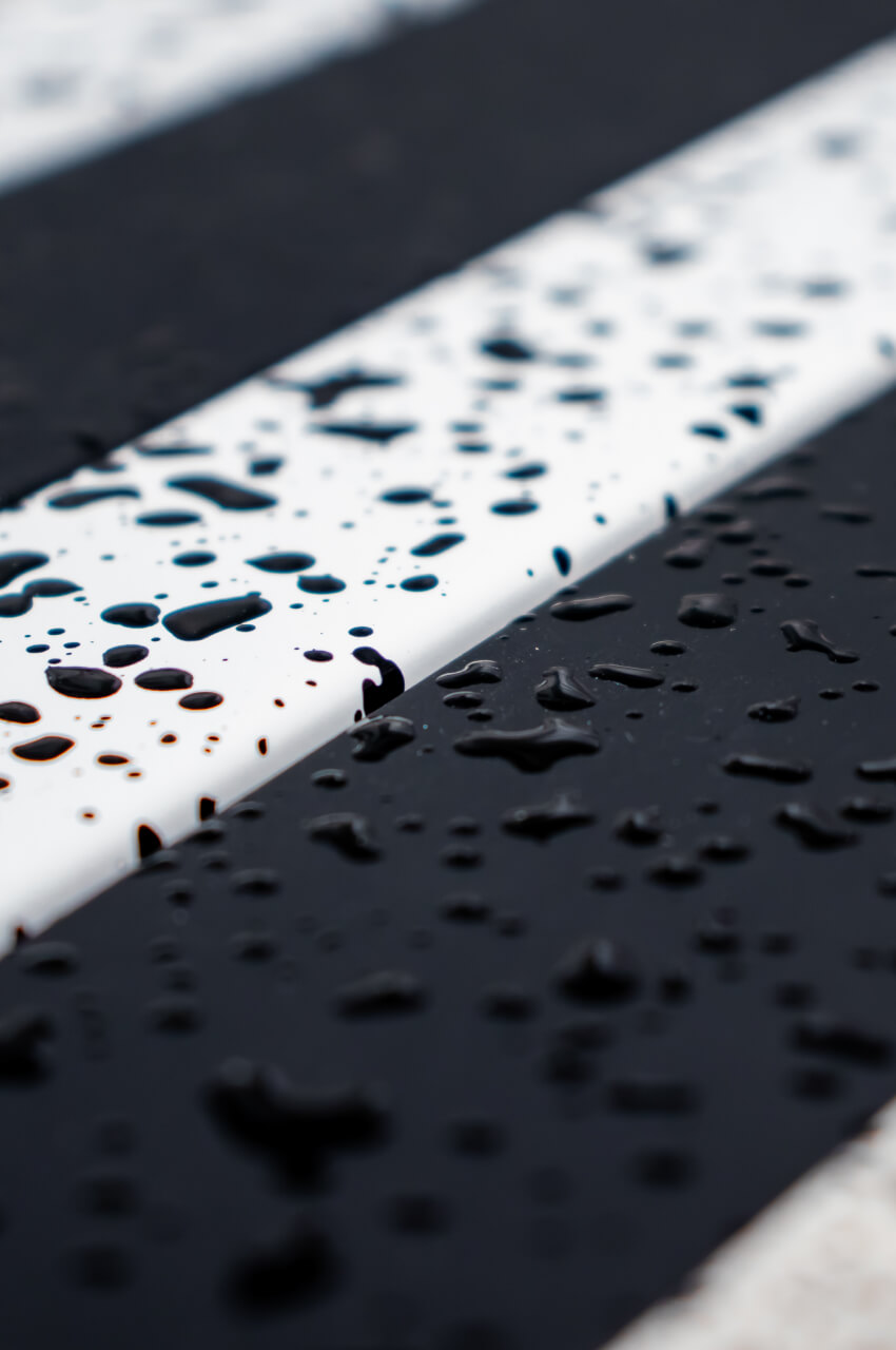 Wood panels colored with wet-effect paints in black and white