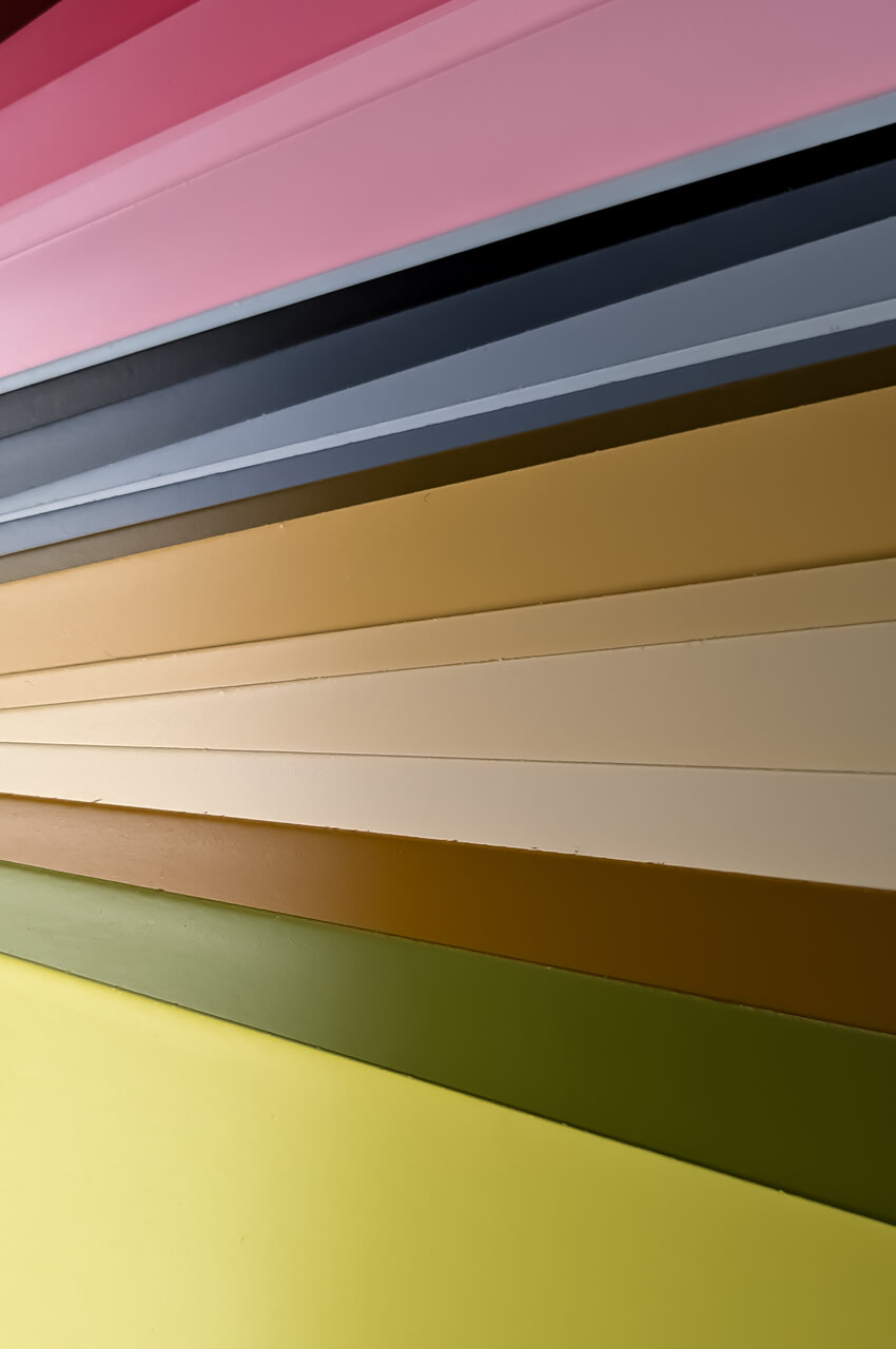 Wood panels painted with water-based finishes for colored frames