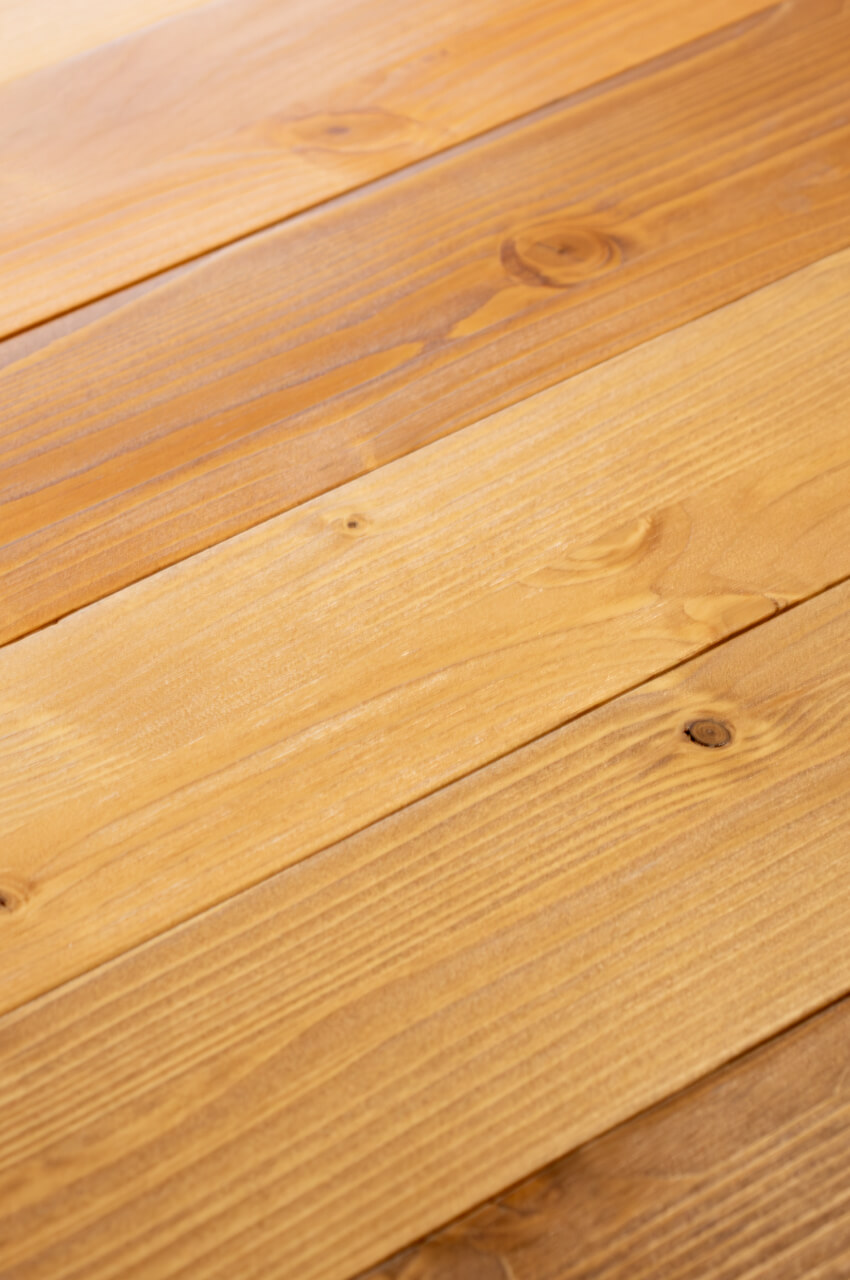Wood for window frames coated with a transparent finish