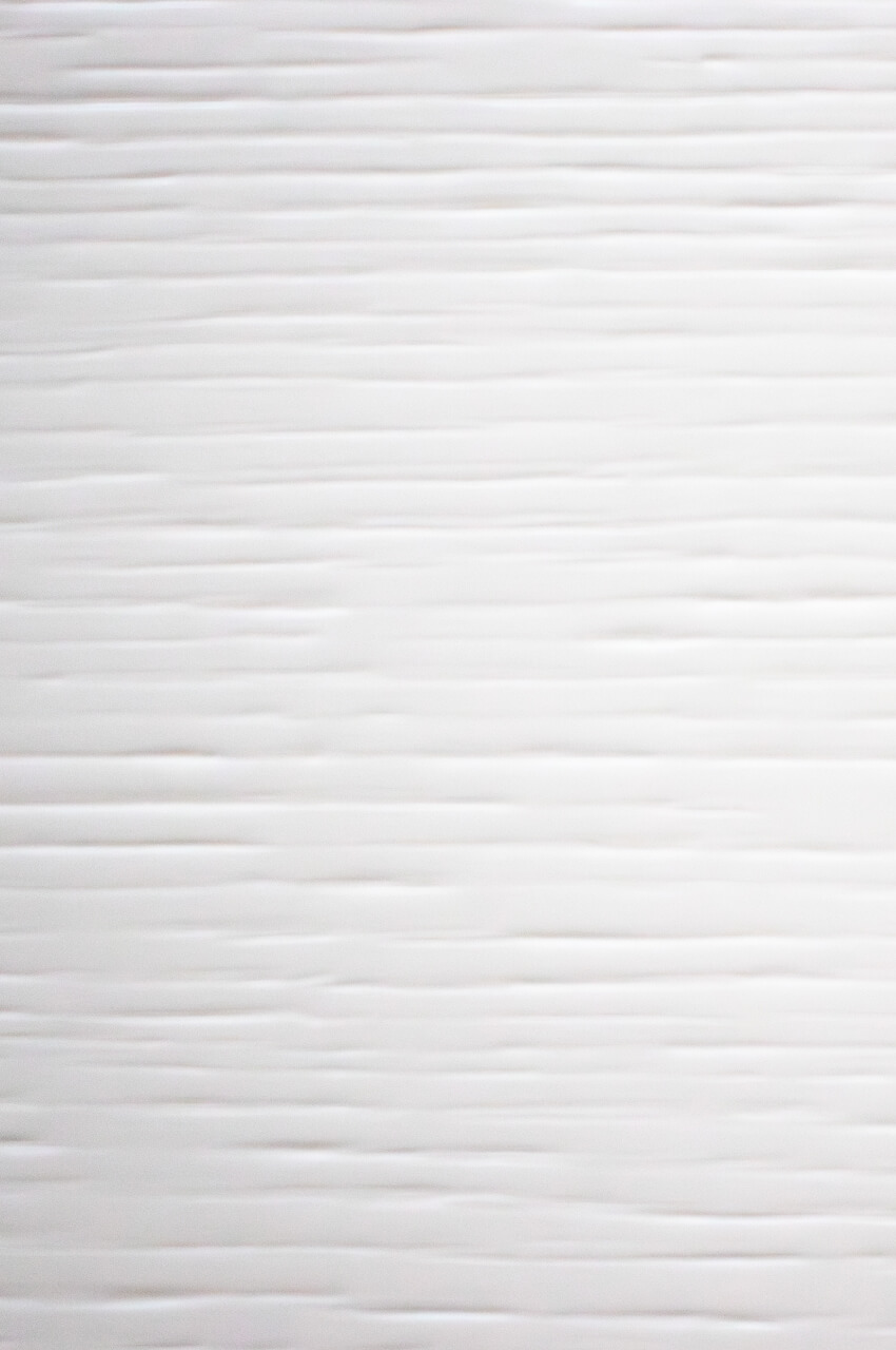Wooden cabinet door painted with white water-based primer