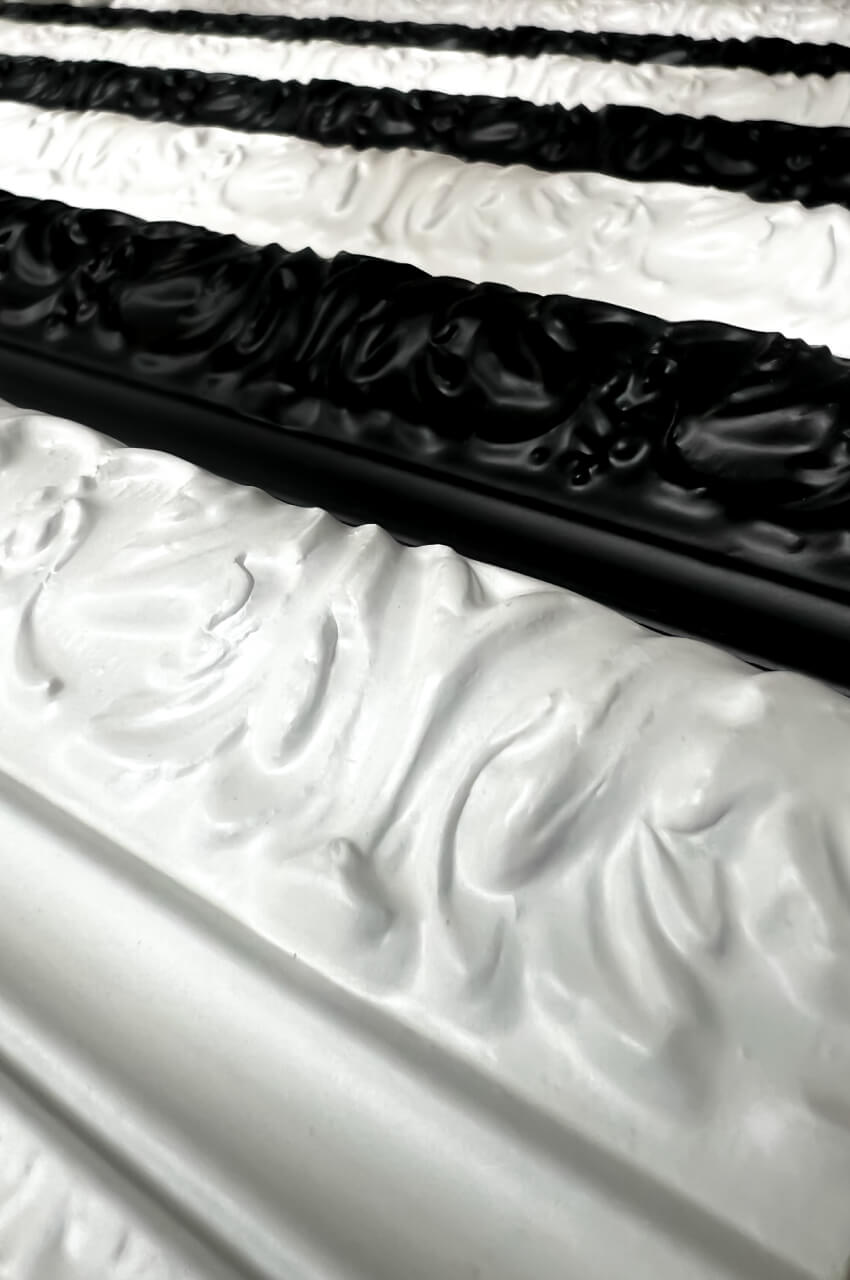 Black and white frames coated with solvent-based spray primer