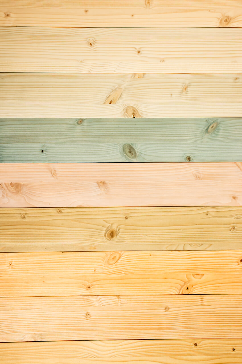 Wooden boards colored with different paints
