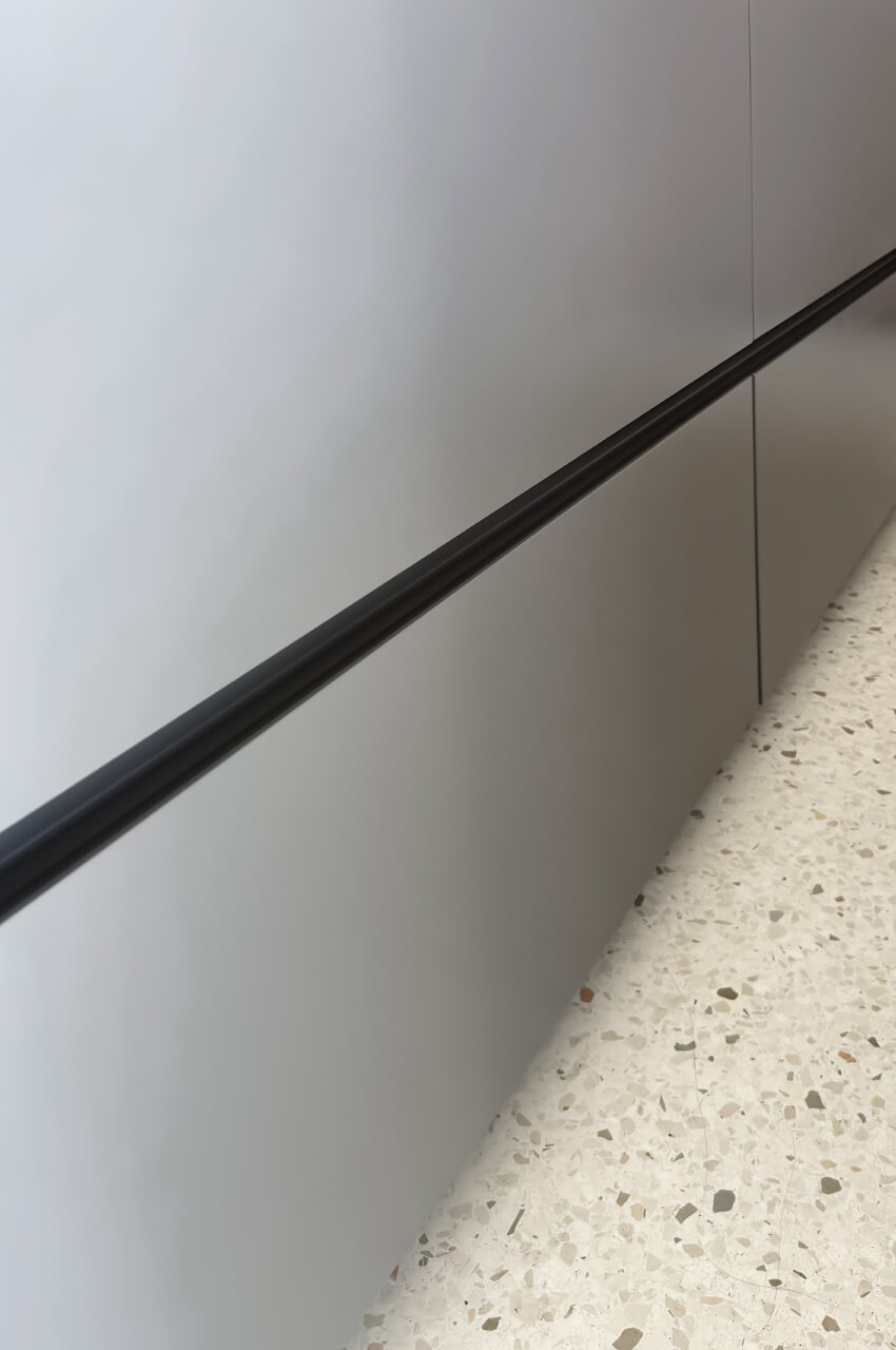Detail of a piece of furniture painted with a white antibacterial finish